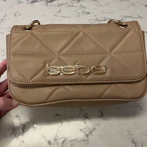 NWT Bebe Womens Beige Gia Crossbody/Shoulder Bag. Metal Handle and Strap.